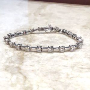 Gorgeous 5.50 carat Moissanite 14kt. White gold bracelet.